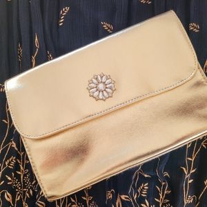 NWOT Gold metallic clutch purse perfect for the holidays